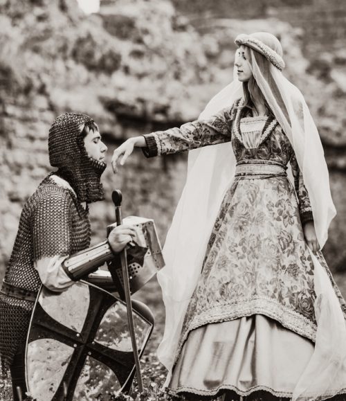 Knight and medieva lady at outdoor. Image in black and white color style